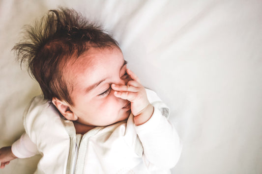 Baby sleeping safely in a Bubbaroo sleeping bag for winter